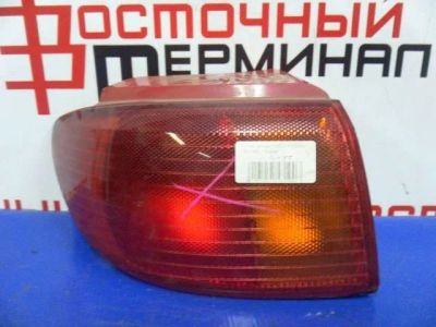 Лот: 11385961. Фото: 1. Стоп-сигнал Mazda Demio, левый. Оптика и освещение