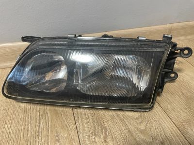 Лот: 25401534. Фото: 1. Фарa б/у Mazda Capella 626 08-216-1136L... Оптика и освещение