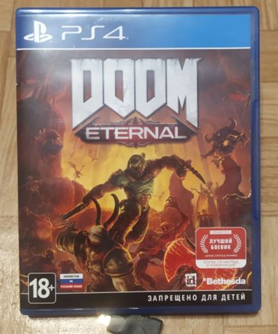 Лот: 15939895. Фото: 1. Doom Eternal для PS4 (диск). Игры для консолей