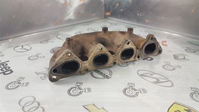 Лот: 23590991. Фото: 1. Коллектор выпускной Mitsubishi... Двигатель и элементы двигателя