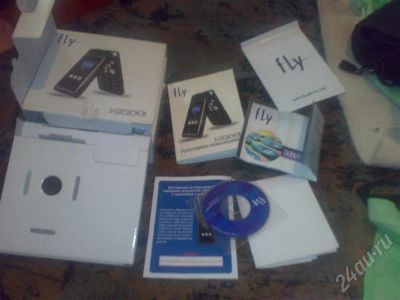 Лот: 729097. Фото: 1. Комплект от FLY MX200. Другое (смартфоны, связь, навигация)