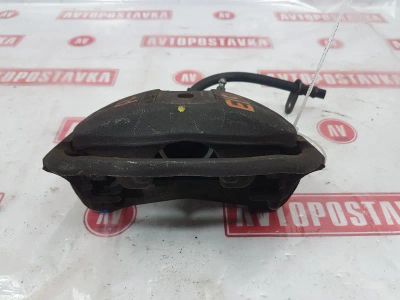 Лот: 20895596. Фото: 1. Суппорт тормозной Toyota Cynos... Тормозная система