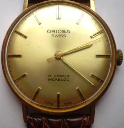 Лот: 7317784. Фото: 1. Наручные золотые швейцарские часы... Оригинальные наручные часы