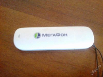 Лот: 1619303. Фото: 1. usb модем E173 мегафон. Проводные модемы