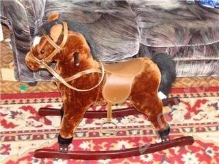 Лот: 501675. Фото: 1. Лошадь качалка музыкальная. Другое (дети растут)