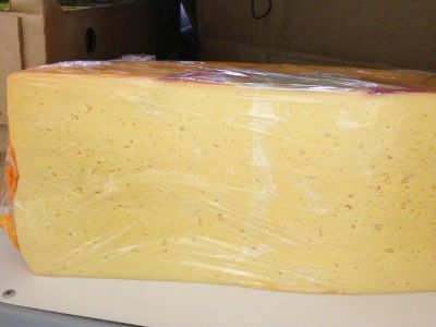 Лот: 6688312. Фото: 1. Сыр "Российский" Люкс. Молоко и молочные продукты