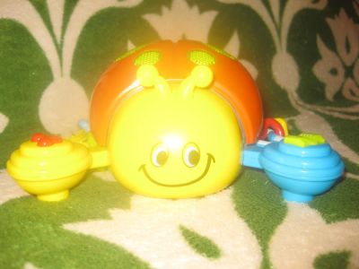 Лот: 10746434. Фото: 1. Музыкальная игрушка Божья коровка. Для младенцев