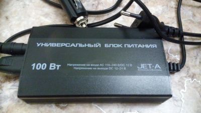Лот: 10062673. Фото: 1. Универсальный блок питания для... Зарядные устройства