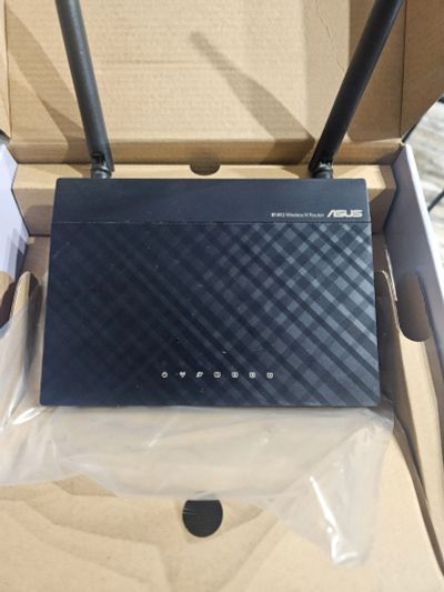 Лот: 24895936. Фото: 1. Роутер Asus RT-N12. Маршрутизаторы (роутеры)