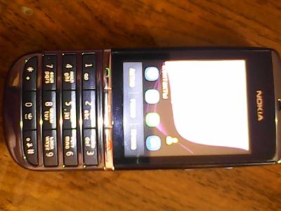 Лот: 6814940. Фото: 1. Nokia Asha 300. Кнопочные мобильные телефоны