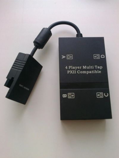 Лот: 7724150. Фото: 1. 4 Players Multi-Tap Connector... Аксессуары для игровых приставок, консолей, геймпады