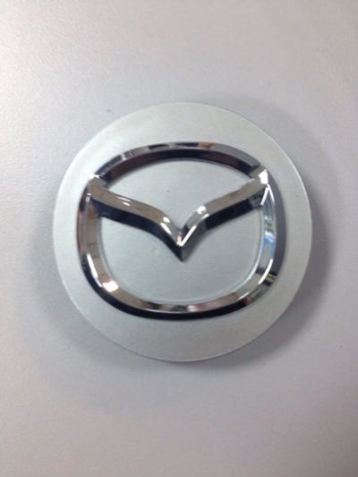 Лот: 8197347. Фото: 1. Колпачок на литье Mazda серый. Колпаки