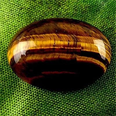 Лот: 10507916. Фото: 1. 25x18x7mm новый натуральный тигровый... Драгоценные и поделочные камни