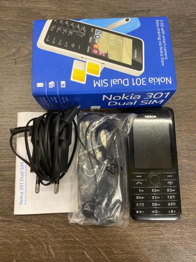 Лот: 19395397. Фото: 1. Nokia 301 Dual Sim, черный, полный... Кнопочные мобильные телефоны