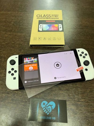 Лот: 20009741. Фото: 1. Защитное стекло для Nintendo Switch... Аксессуары для игровых приставок, консолей, геймпады
