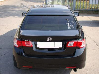 Лот: 3295533. Фото: 1. Наклейка Hello Kitty с автоматом. Наклейки автомобильные
