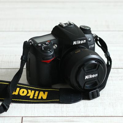 Лот: 4076896. Фото: 1. Nikon D7000 + Nikkor 35mm 1.8... Цифровые зеркальные