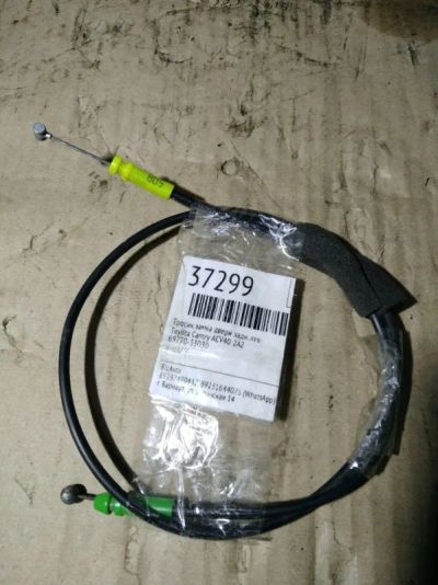 Лот: 21410467. Фото: 1. Тросик замка двери Toyota Camry... Двигатель и элементы двигателя
