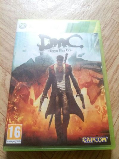 Лот: 12078618. Фото: 1. DMC Devil May Cry - xbox 360. Игры для консолей