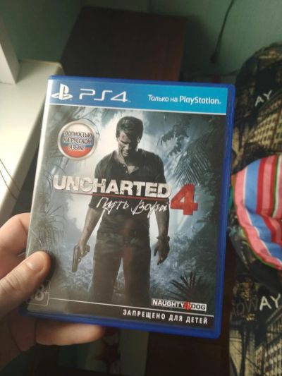Лот: 11034507. Фото: 1. Uncharted 4: Путь вора [Лицензионный... Игры для консолей