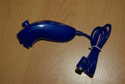 Лот: 1571314. Фото: 1. Новый Nintendo Wii Nunchuk, нунчак... Аксессуары для игровых приставок, консолей, геймпады