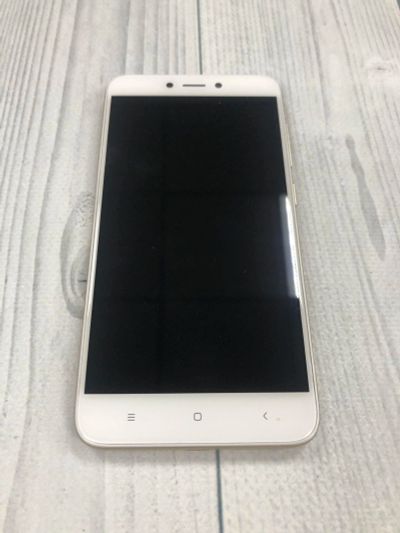Лот: 14814565. Фото: 1. Xiaomi Redmi 4X 16Gb Gold (Б/У... Смартфоны