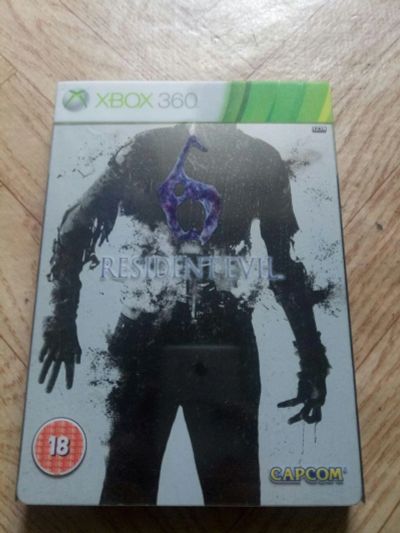Лот: 12078585. Фото: 1. Resident Evil 6 Steelbook - Xbox... Игры для консолей