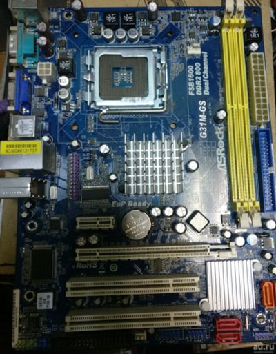 Лот: 12801563. Фото: 1. Материнская плата AsRock G31M-GS. Материнские платы