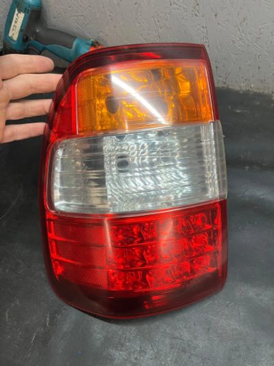 Лот: 21376353. Фото: 1. Фонарь задний левый land cruiser... Оптика и освещение
