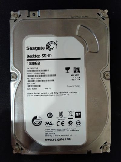 Лот: 14356319. Фото: 1. Гибридный диск Seagate ST1000DX001... Жёсткие диски (HDD)