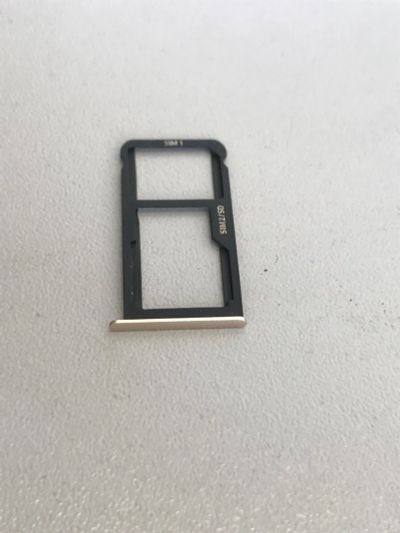 Лот: 16084518. Фото: 1. Сим лоток zte blade a910. Корпуса, клавиатуры, кнопки