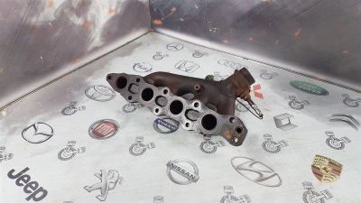 Лот: 23587253. Фото: 1. Коллектор выпускной Suzuki Jimny... Двигатель и элементы двигателя