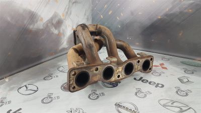 Лот: 23590834. Фото: 1. Коллектор выпускной SsangYong... Двигатель и элементы двигателя