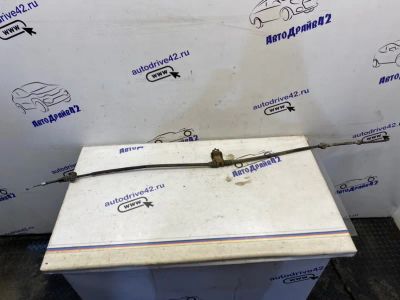 Лот: 21712820. Фото: 1. тросик ручного тормоза Mitsubishi... Двигатель и элементы двигателя