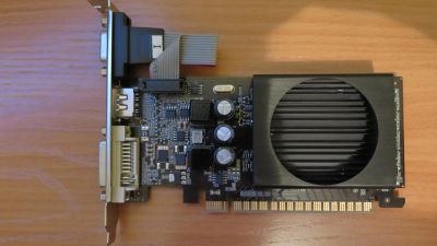 Лот: 7962383. Фото: 1. видеокарта GT520 1024M DDR3 64B. Видеокарты