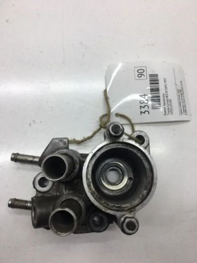 Лот: 20374601. Фото: 1. Корпус термостата Toyota Corolla... Двигатель и элементы двигателя