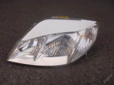 Лот: 66850. Фото: 1. Фара от Toyota Corolla Fielder. Оптика и освещение