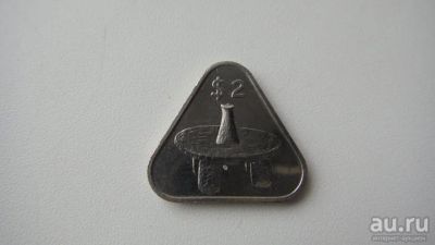 Лот: 9441471. Фото: 1. Треугольная монета Островов Кука. Австралия и Океания