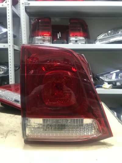 Лот: 25639480. Фото: 1. Задний (L) фонарь Toyota Land... Оптика и освещение