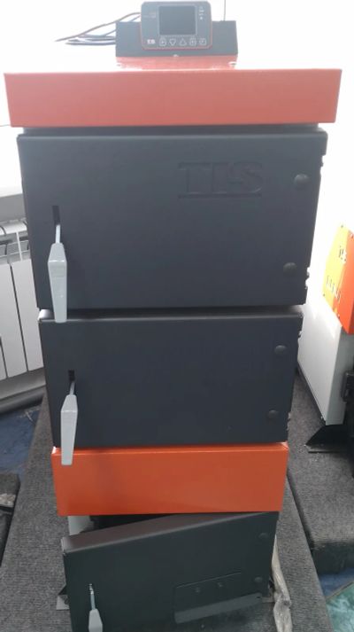 Лот: 20276265. Фото: 1. Котел твердотопливный TIS. Отопительные котлы, печи