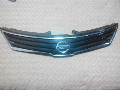 Лот: 7940635. Фото: 1. решетка радиатора nissan Tiida. Кузов