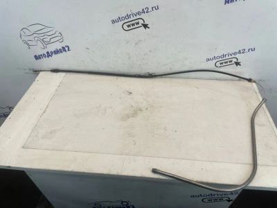 Лот: 24627476. Фото: 1. тросик ручного тормоза Renault... Двигатель и элементы двигателя