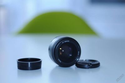 Лот: 5901284. Фото: 1. Nikon 50 мм 1:1.8D Состояние нового... Объективы