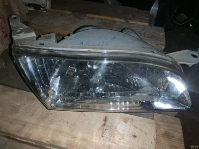 Лот: 8511716. Фото: 1. Фара правая Toyota Corolla AE110. Оптика и освещение