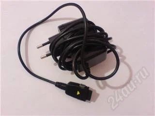 Лот: 33804. Фото: 1. зарядное устройство LG F1200. Зарядные устройства, блоки питания, адаптеры сетевые для смартфонов