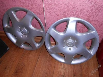 Лот: 2289347. Фото: 1. колпакаи MAZDA оригинал 13 2щт. Колпаки