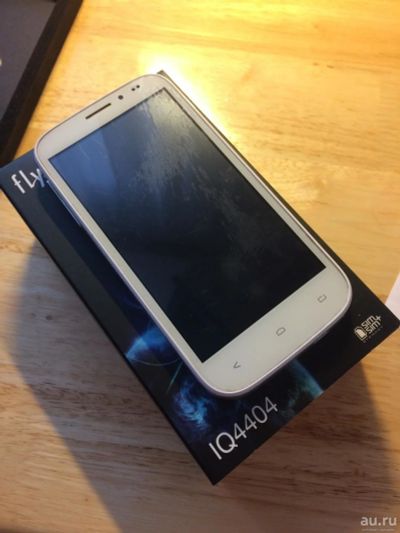 Лот: 8818396. Фото: 1. Смартфон Fly IQ4404 spark. White... Смартфоны