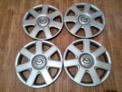 Лот: 3331522. Фото: 1. Оригинальные колпаки Mazda R15. Колпаки
