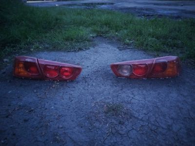 Лот: 25669486. Фото: 1. Заводская задняя оптика Митсубиси... Оптика и освещение
