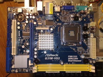 Лот: 9011508. Фото: 1. ASRock G31M-VS2. Материнские платы